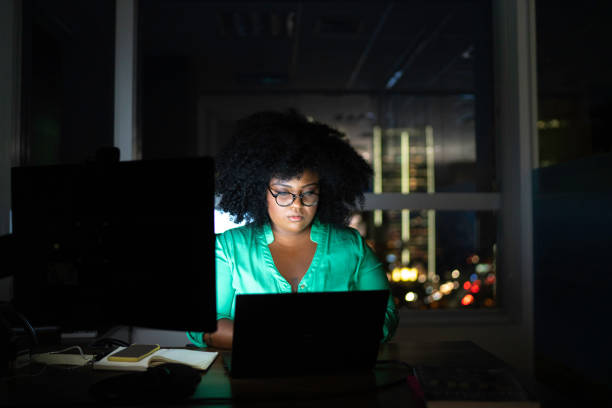 Businesswoman working late in the office